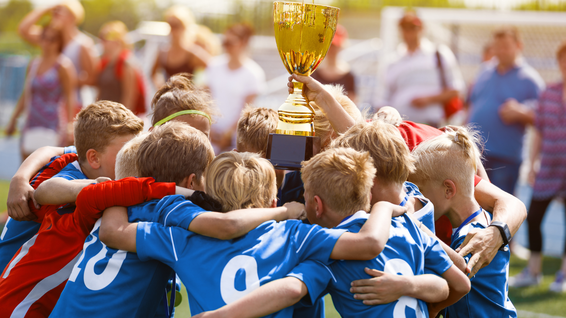 Youth team champions with trophy